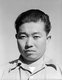 USA / Japan: Benji Iguchi, tractor driver. Manzanar Japanese American Internment Camp, Ansel Adams, 1943